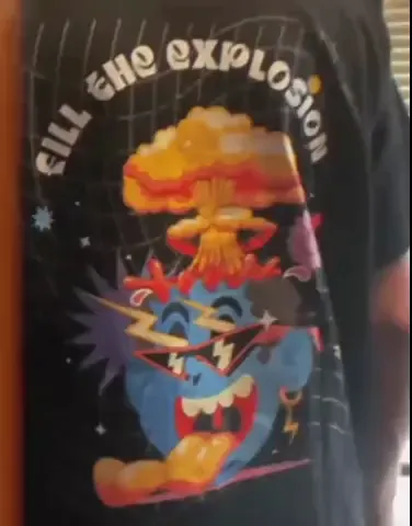 A printed t-shirt seen through a phone, its cartoon characters coming to life