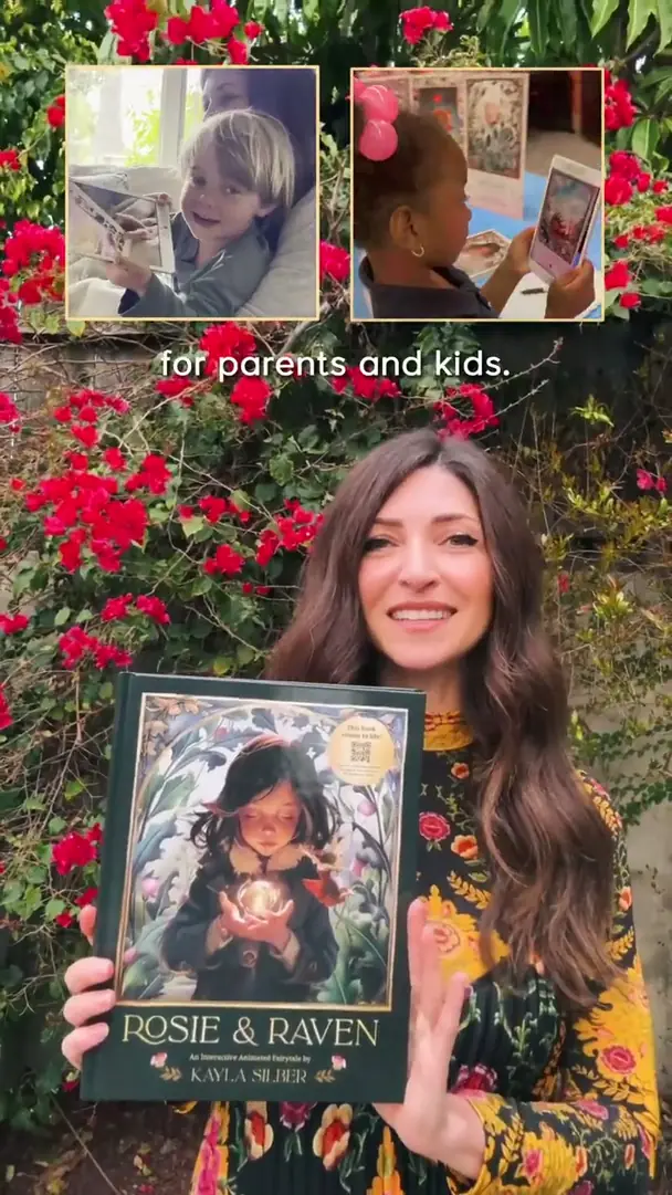 A page of Rosie & Raven by Kayla Silber seen through a phone, the illustration coming to life