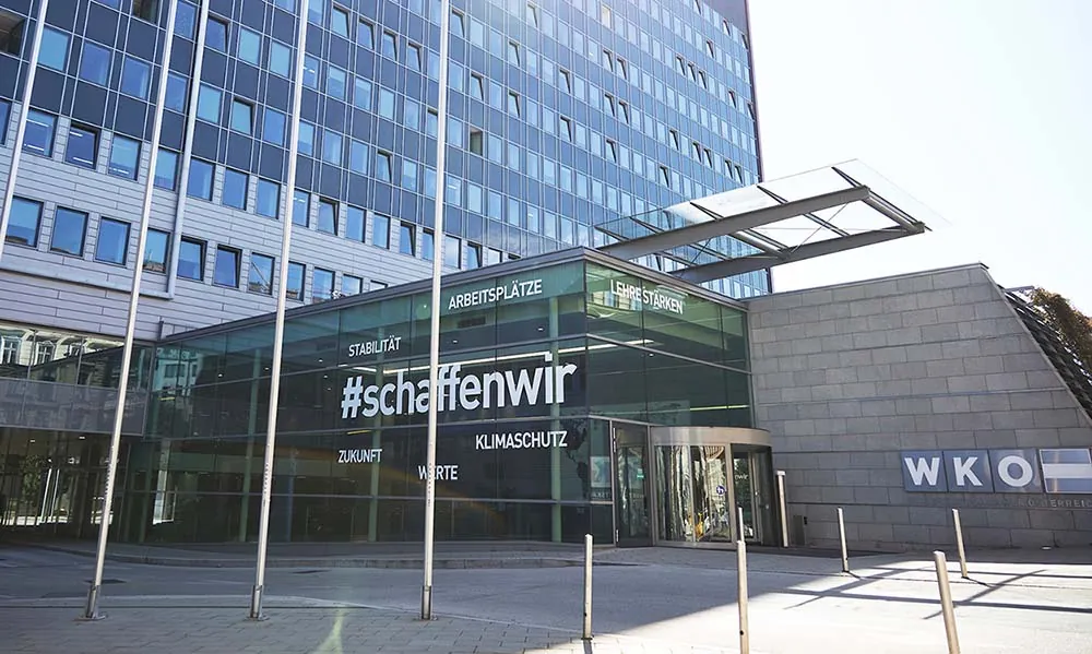 WKO headquarters entrance with #schaffenwir lettering on the glass facade